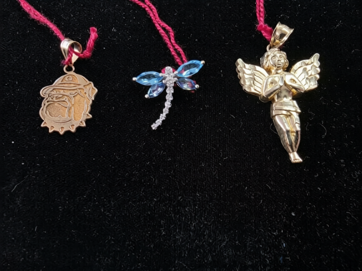 Religious and vintage style gold pendants and medallions