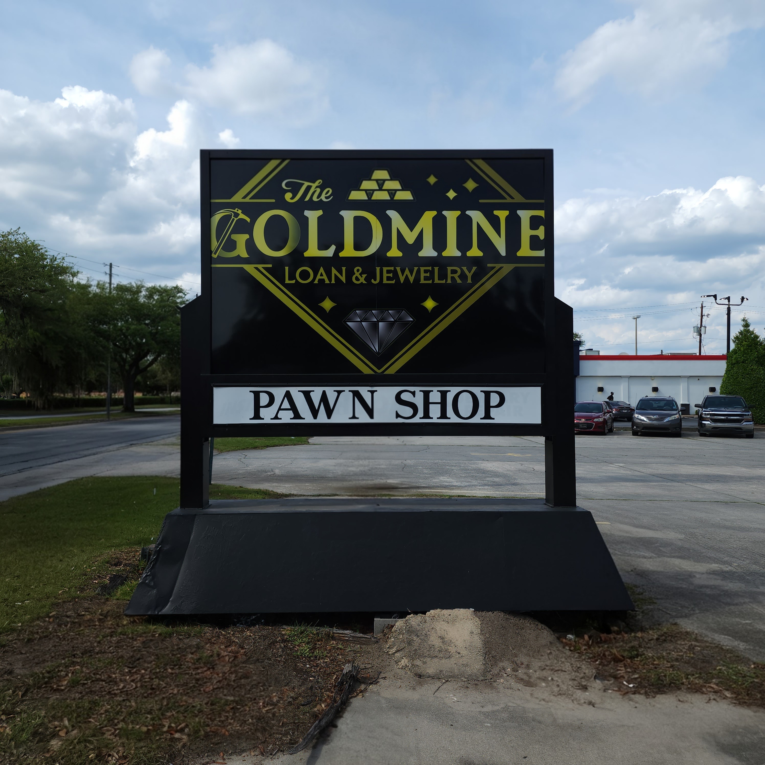 Gold Mine Loan & Jewelry roadside sign at 8110 White Bluff Rd # A, Savannah, GA